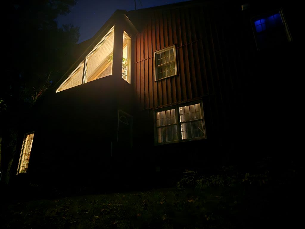 The view of my house from the front, shot at night. This was what we came to see as we approached from the clearing where we often stargazed to pass the time.